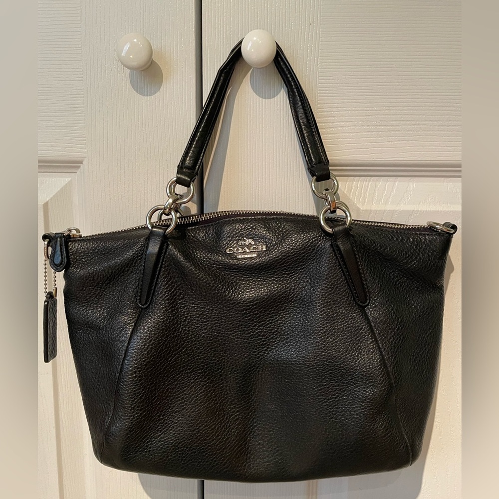 Black coach handbag.